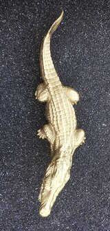 krokodil polyester beeld goud