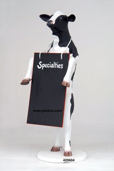 Staande koe met menubord 
