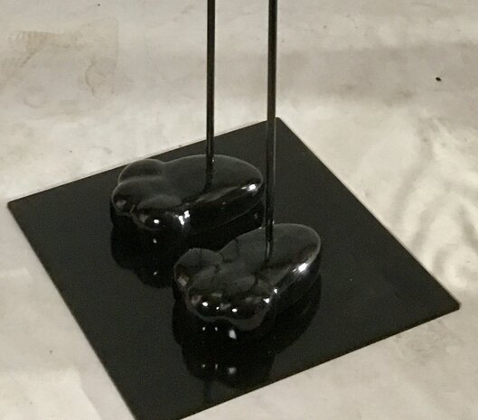 Vogel kunstwerk op metalen voet 