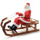 Kerstman op houten slee