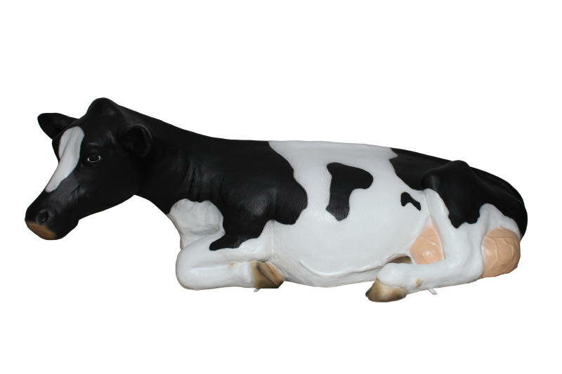 Koe liggend - zwartbont - levensgroot